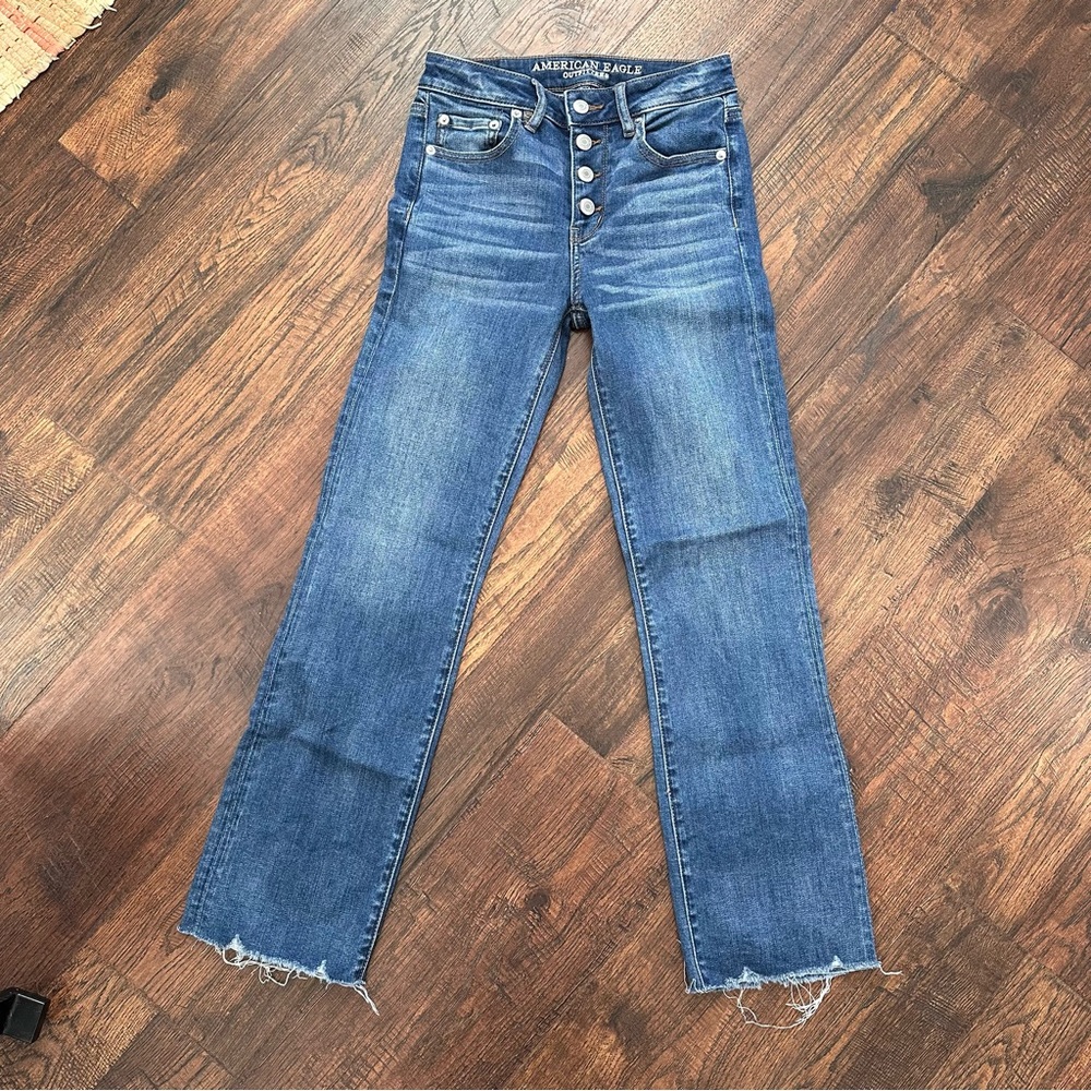 American Eagle Stretch mid rise button fly jeans.